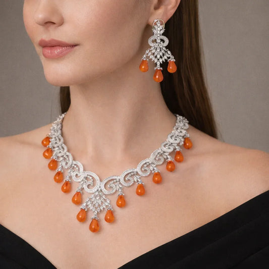 Silver Coral Cascade AD Necklace Set by Jinam featuring intricate coral-inspired silver jewelry with matching earrings.
