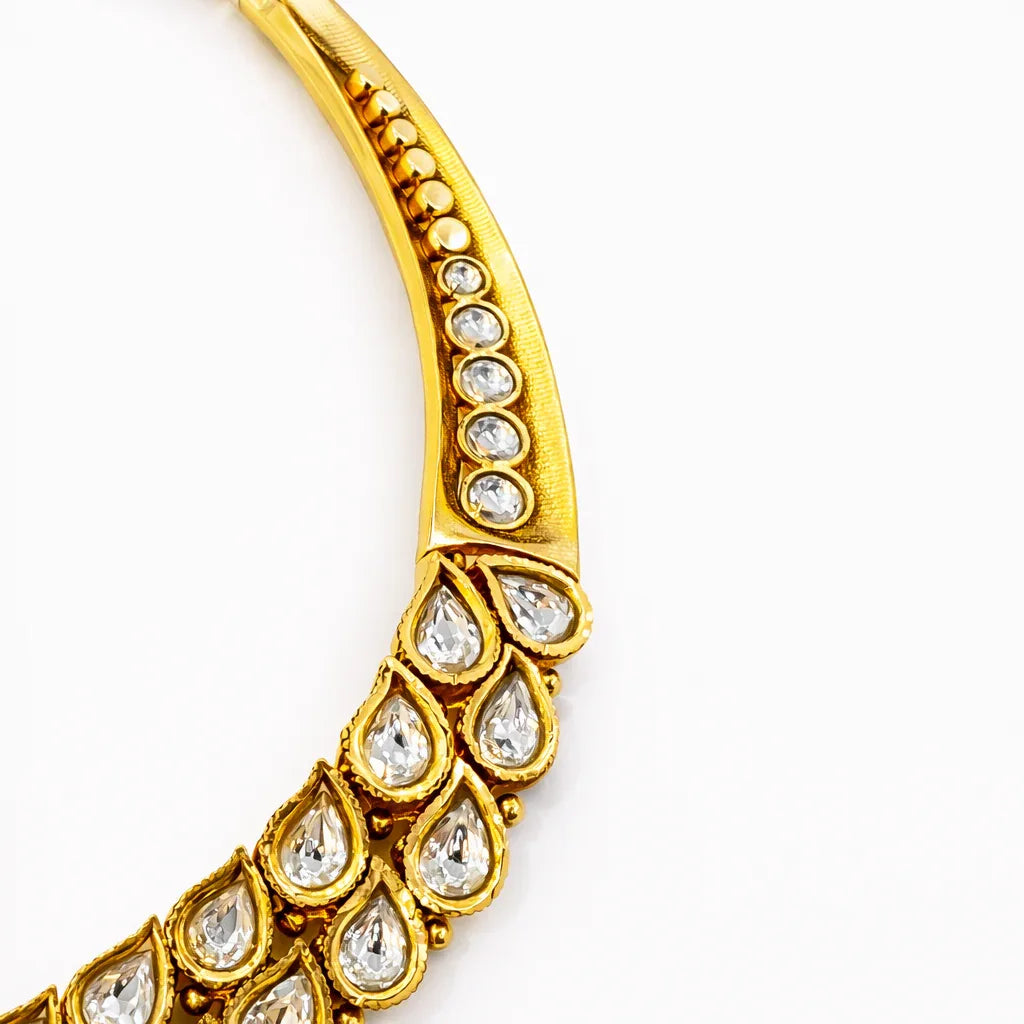 Jinam Royal Polki Kundan Pearl Necklace Set featuring intricate jewelry with pearls, Kundan work, and traditional design.