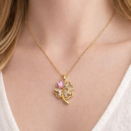 Jinam pink heart and clover gold pendant set with chain, featuring a delicate jewelry design and romantic heart-shaped charm.