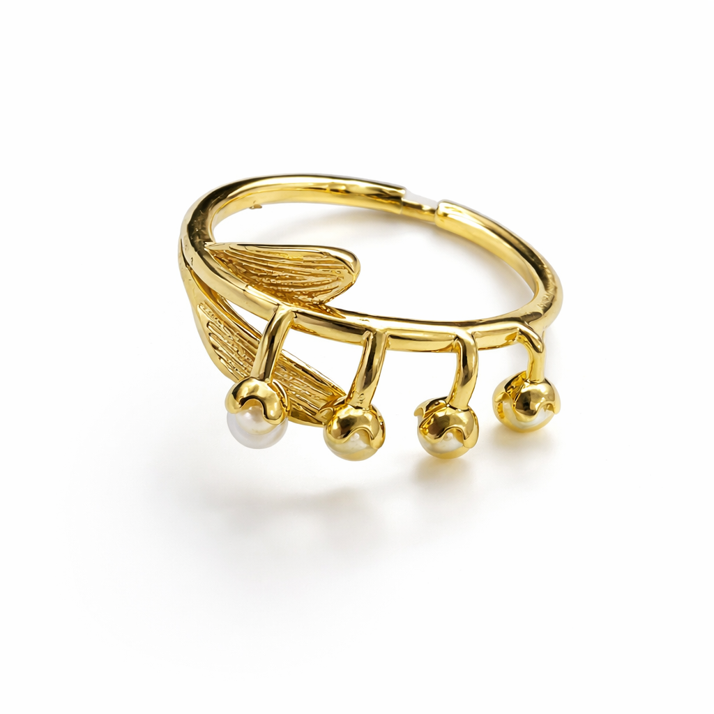 Jinam Golden Bloom Pearl Branch adjustable ring featuring a delicate floral design with gold tones and pearl accents.