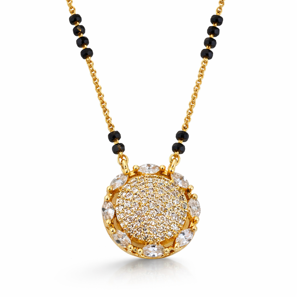 Jinam Radiant Round CZ Mangalsutra pendant in gold finish with intricate design and central gemstone, ideal for traditional jewelry.