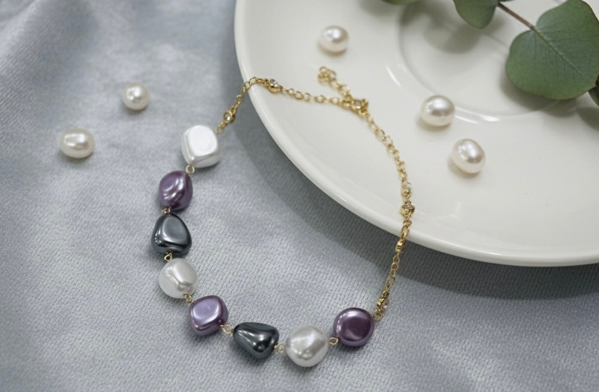 Colorful pearl chain bracelet by Jinam featuring multicolour pearls on a delicate jewelry design.