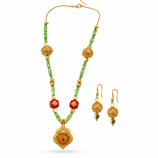 Gold Filigree Necklace Set with matching drop earrings on white background showing full chain and earring detail