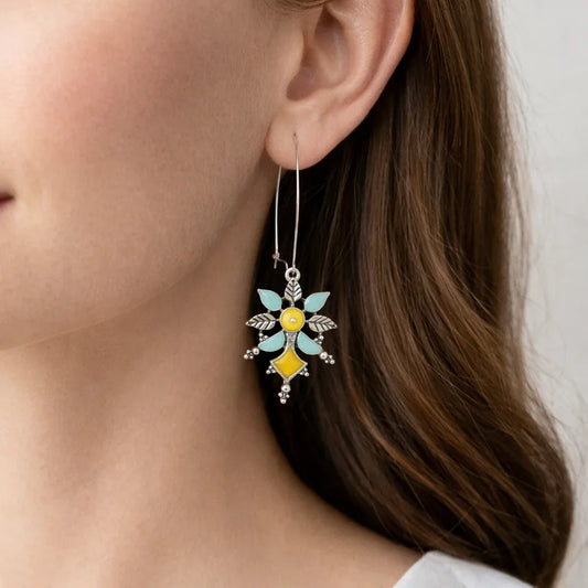 Colorful enamel dangler earrings with pearl drops by Jinam, featuring vibrant, decorative design and elegant pearl accents.