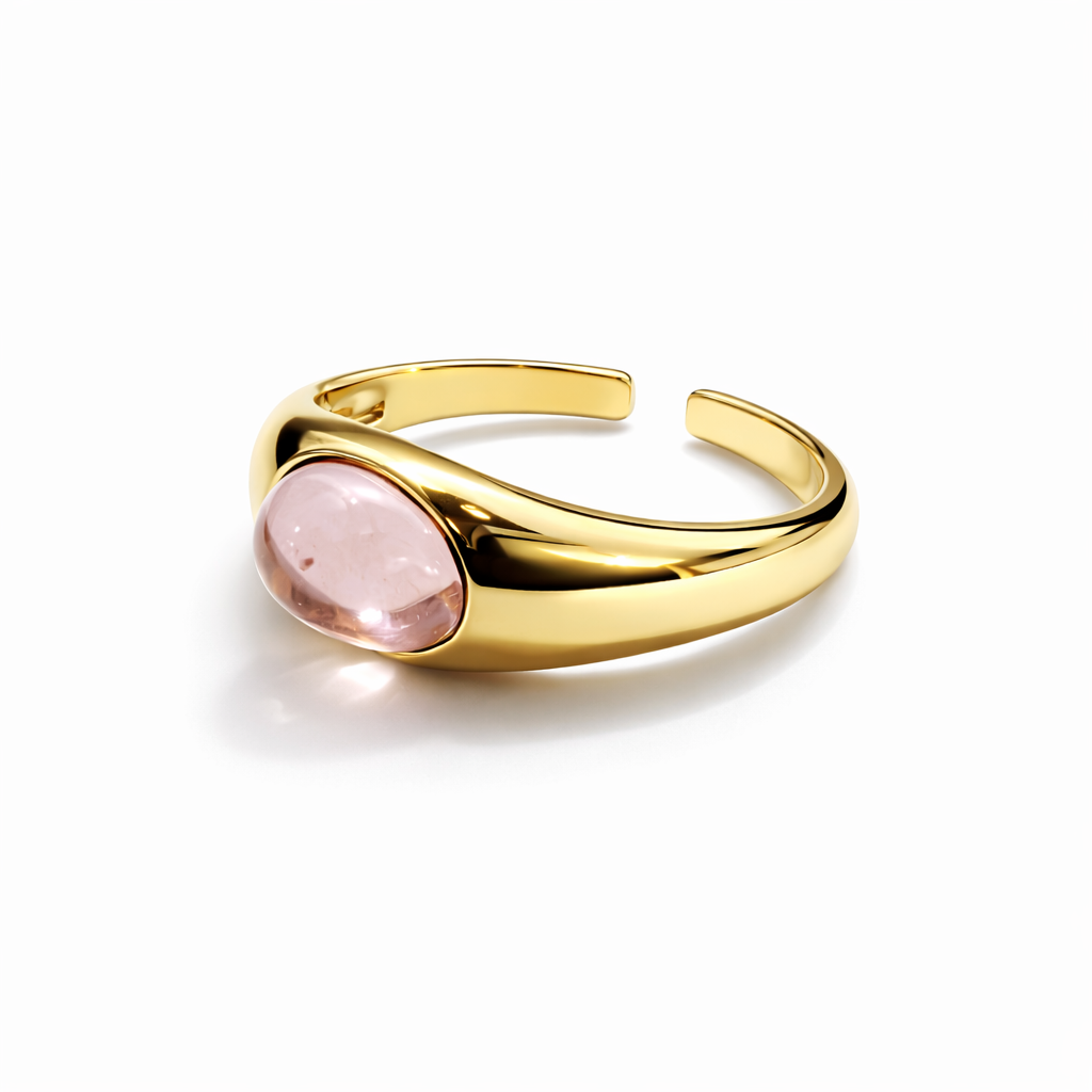 Jinam pink stone statement gold ring with adjustable band, showcasing a vibrant pink gemstone and elegant gold setting.