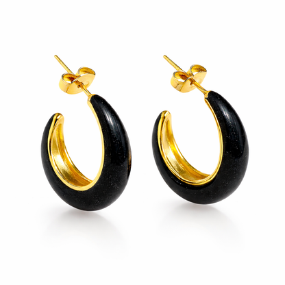 Jinam black enamel chunky hoop earrings with bold circular design, glossy finish, and large statement style.