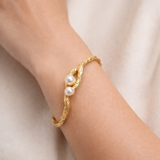 Elegant Gold Textured Open Cuff Bracelet with Dual Pearl Accent