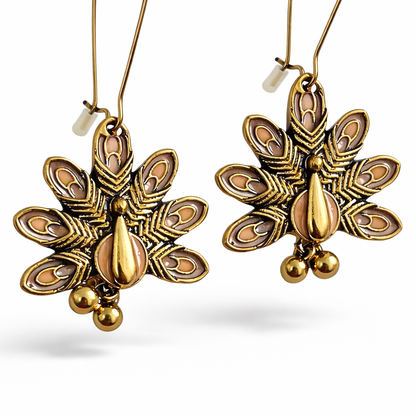 Gold-plated peacock motif hook earrings by Jinam featuring intricate antique gold design and elegant craftsmanship.
