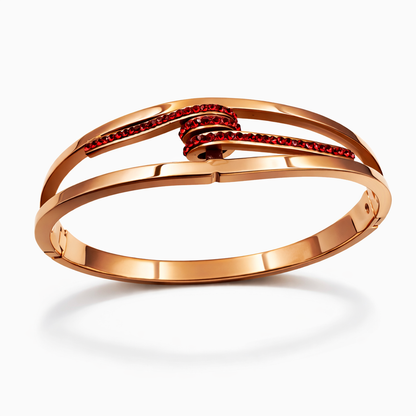Rose Gold Knot Bracelet with Red Crystal Accents