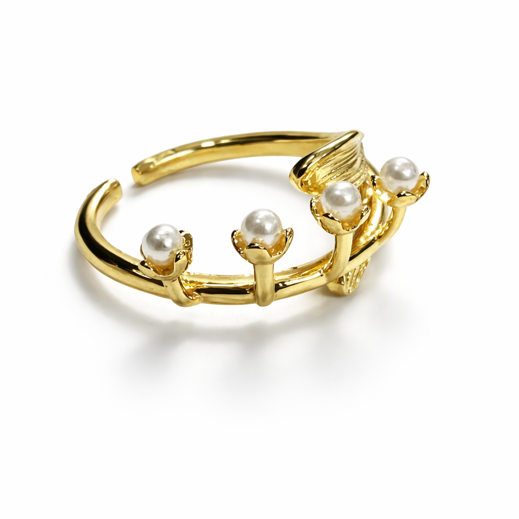 Jinam Golden Bloom Pearl Branch adjustable ring featuring a delicate floral design with gold-tone and pearl accents.