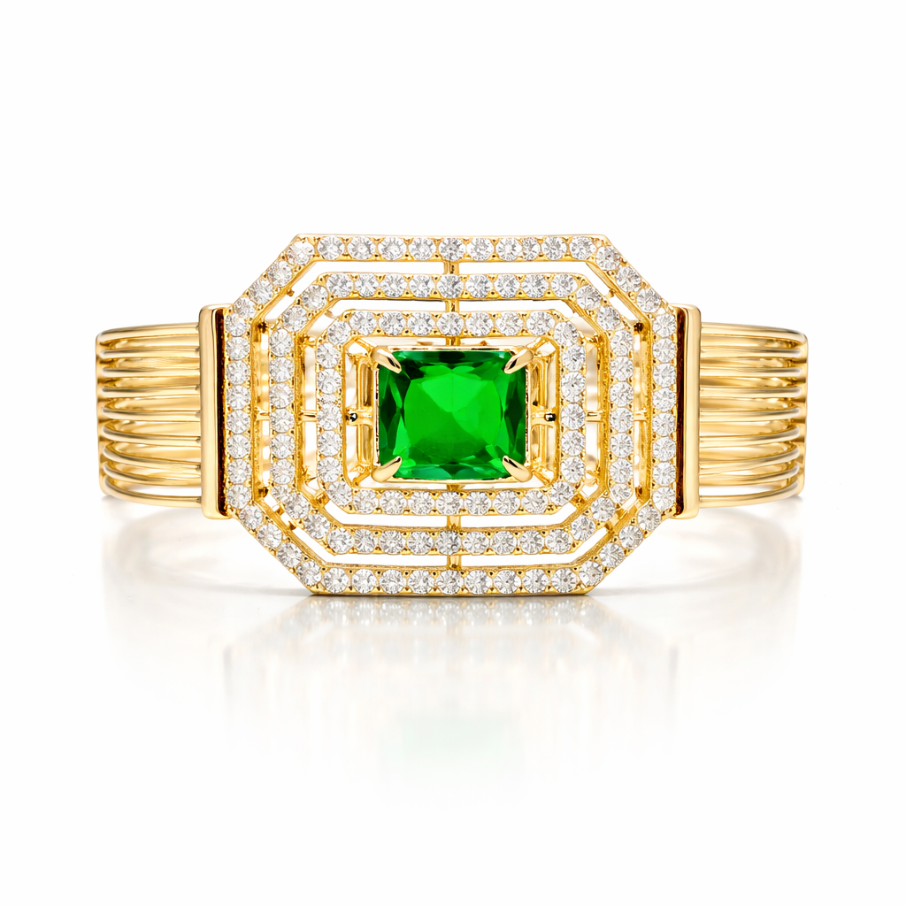 Gold-plated emerald octagon bracelet featuring a sleek design with vibrant green gemstones and elegant gold accents.
