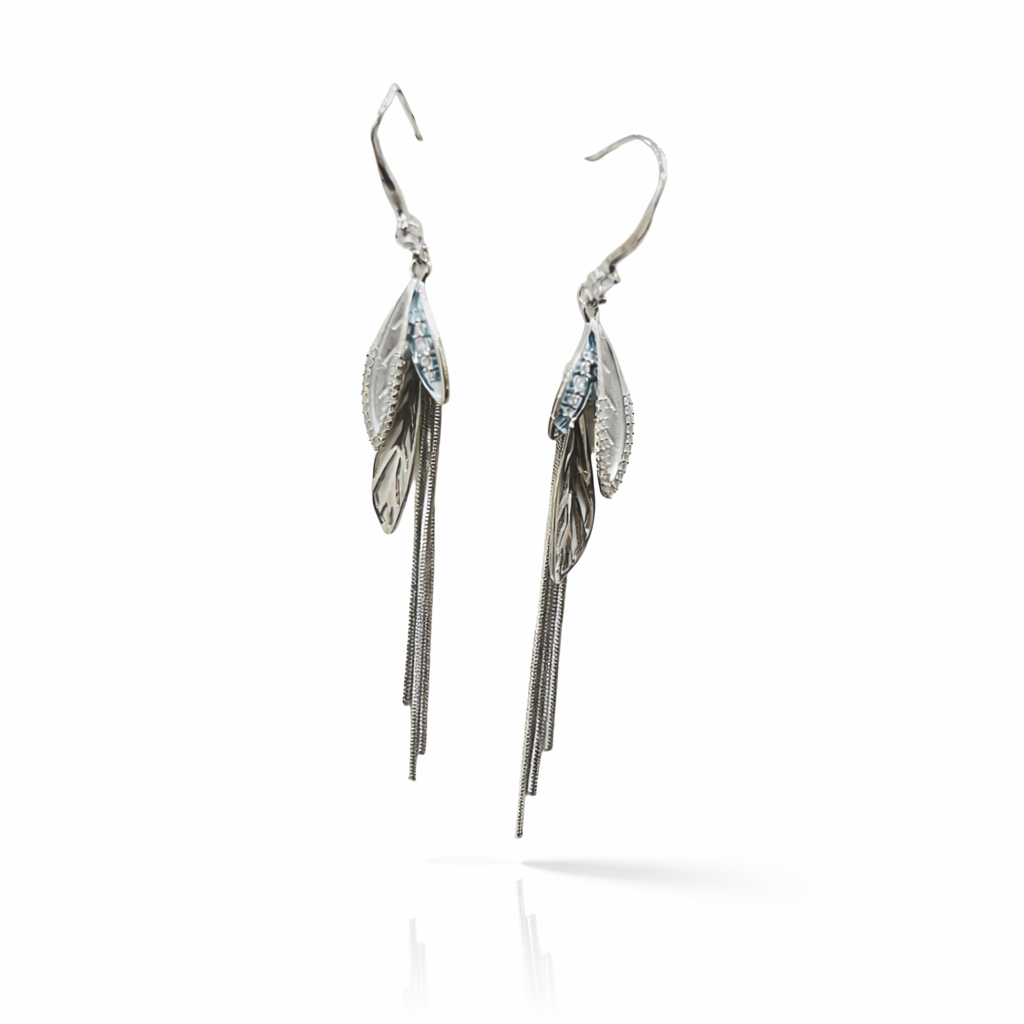 Silver-plated long tassel earrings by Jinam featuring elegant, flowing tassel design and metallic finish.
