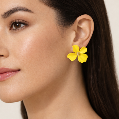 Bright yellow matte floral statement earrings by Jinam, featuring bold flower designs and modern earring style.