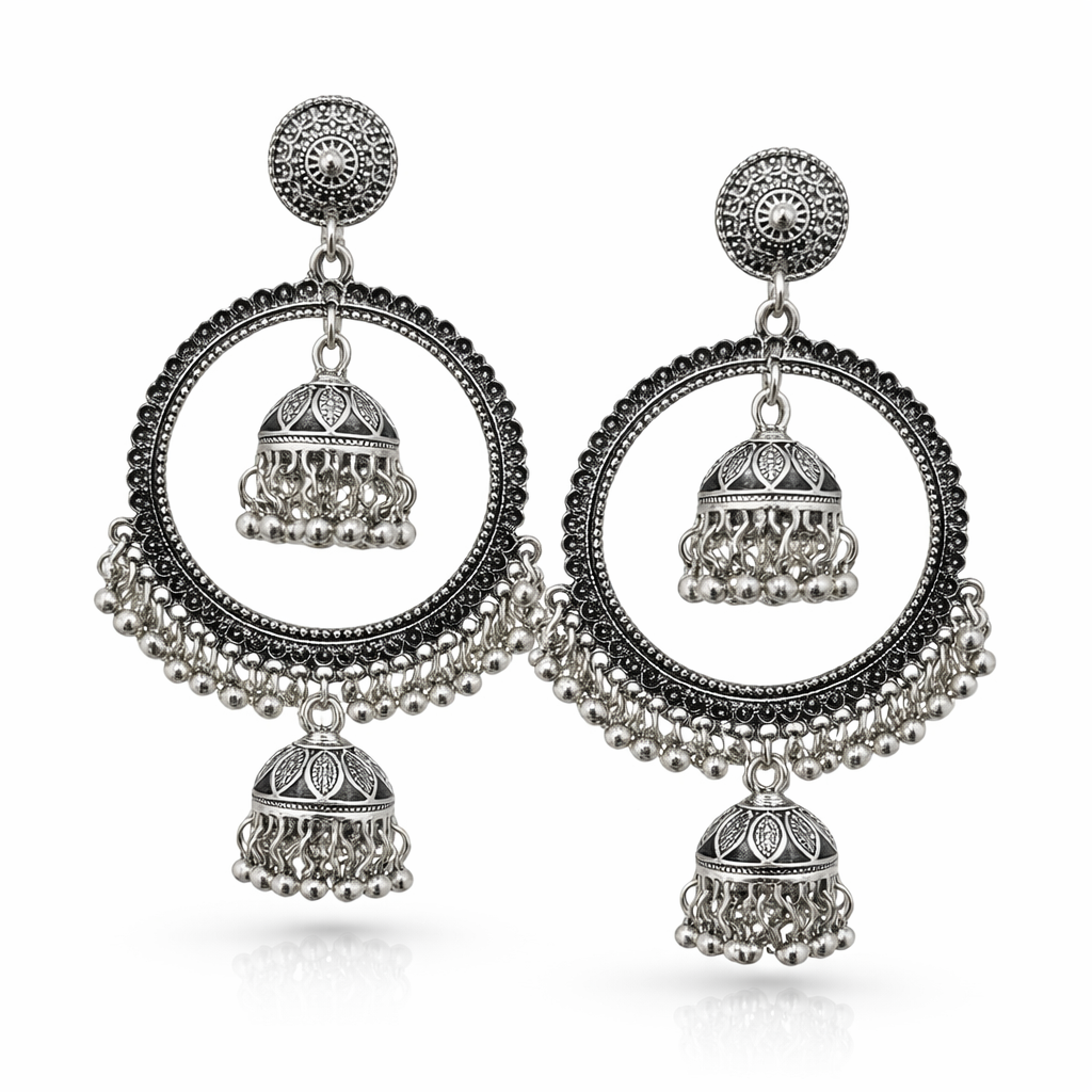 Oxidised silver hoop earrings with dual jhumka design from Jinam, featuring intricate traditional style jewelry.
