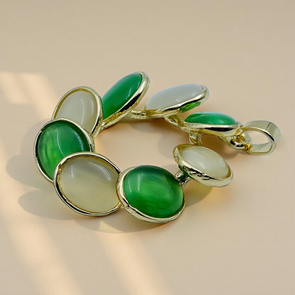 Elegant Dual-Tone Green & Beige Oval Stone Earrings