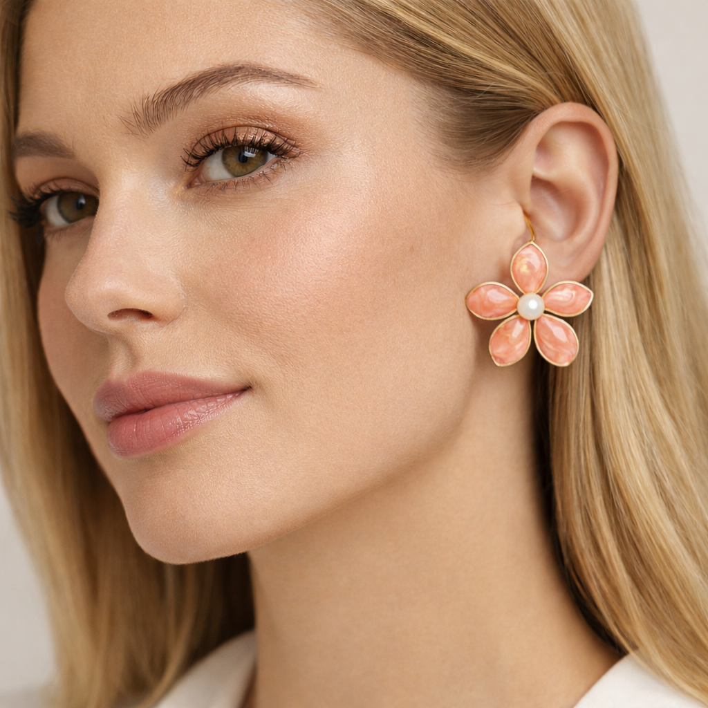 Jinam Peach Swirl Enamel Floral Stud Earrings with Pearl Center, showcasing delicate enamel flowers and elegant pearl accents.