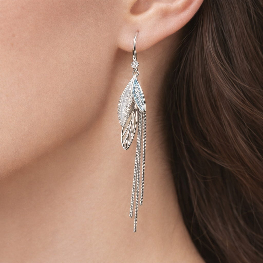 Silver-plated long tassel earrings by Jinam featuring elegant, flowing design and intricate details.