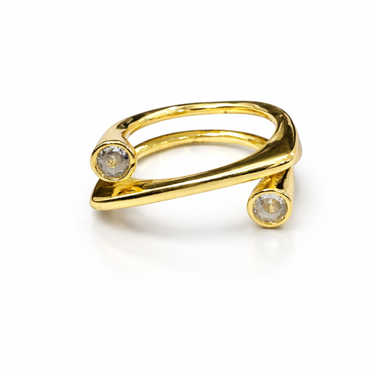 Gold plated Jinam dual crystal open band ring with adjustable size, featuring sparkling crystals on a sleek, open design.