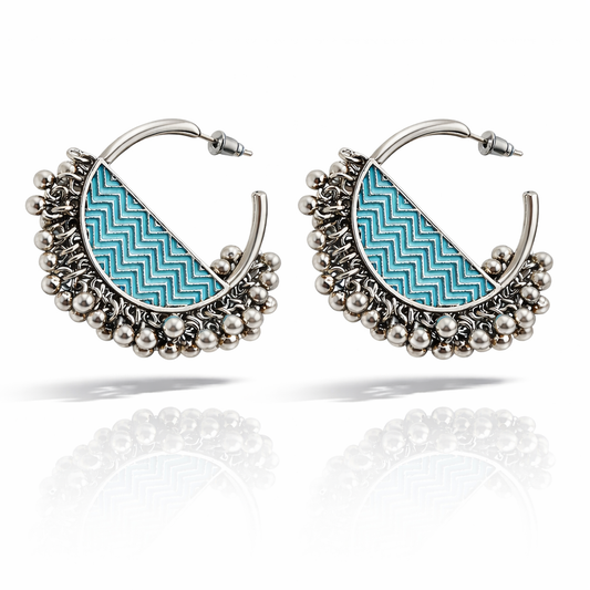 Jinam oxidised silver hoop earrings with colorful enamel and bead detailing, showcasing intricate craftsmanship and vibrant design.