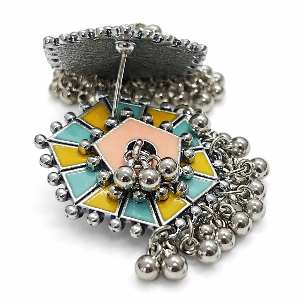 Colorful enamel stud earrings with silver ghungroo detailing, stylish Jinam earrings for a vibrant, traditional look.