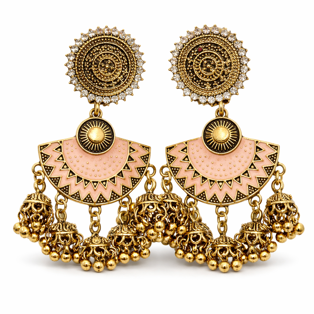 Gold-plated peach enamel dangler earrings with jhumka drops by Jinam, featuring intricate traditional Indian jewelry design.
