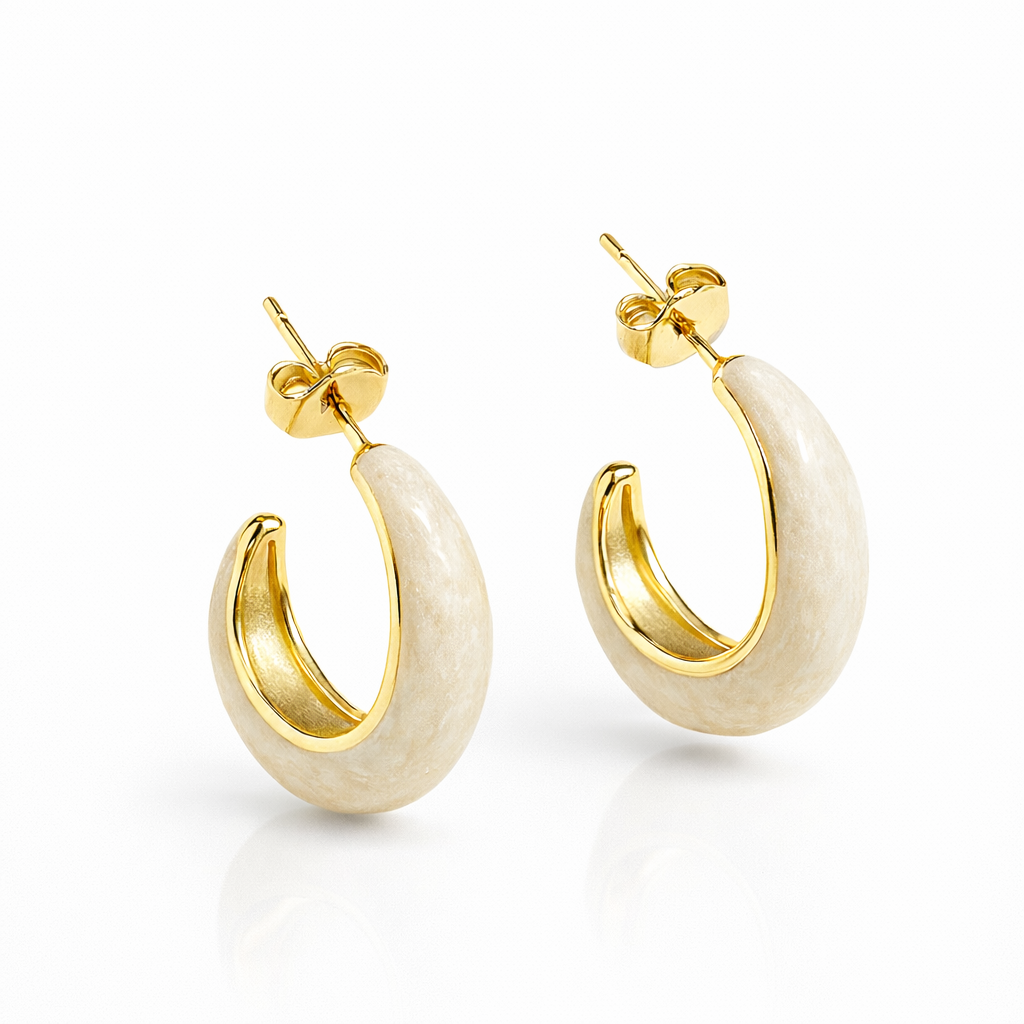 Beige enamel chunky hoop earrings by Jinam, featuring bold, rounded design with glossy enamel finish and large diameter.