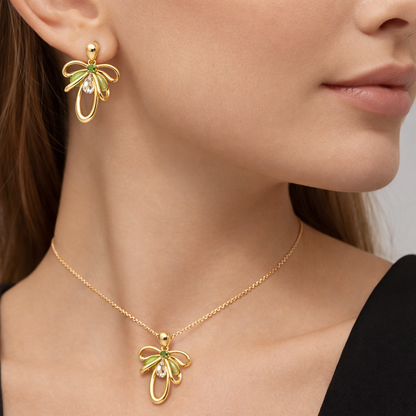 Jinam elegant green crystal bow pendant set with matching earrings and chain, featuring sparkling jewelry with a delicate design.