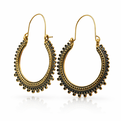 Antique gold-plated hoop earrings with black stone details from Jinam, showcasing elegant circular jewelry design.
