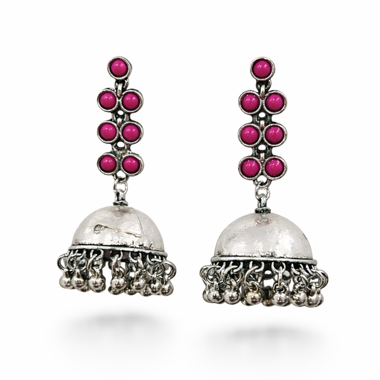 Oxidised silver jhumka earrings with pink stone accents, intricate design, traditional jewelry by Jinam
