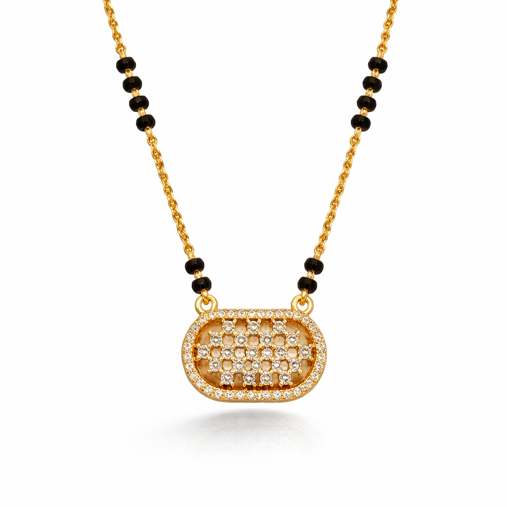 Gold finish lattice oval CZ mangalsutra pendant featuring intricate design from Jinam, showcasing traditional jewelry craftsmanship.