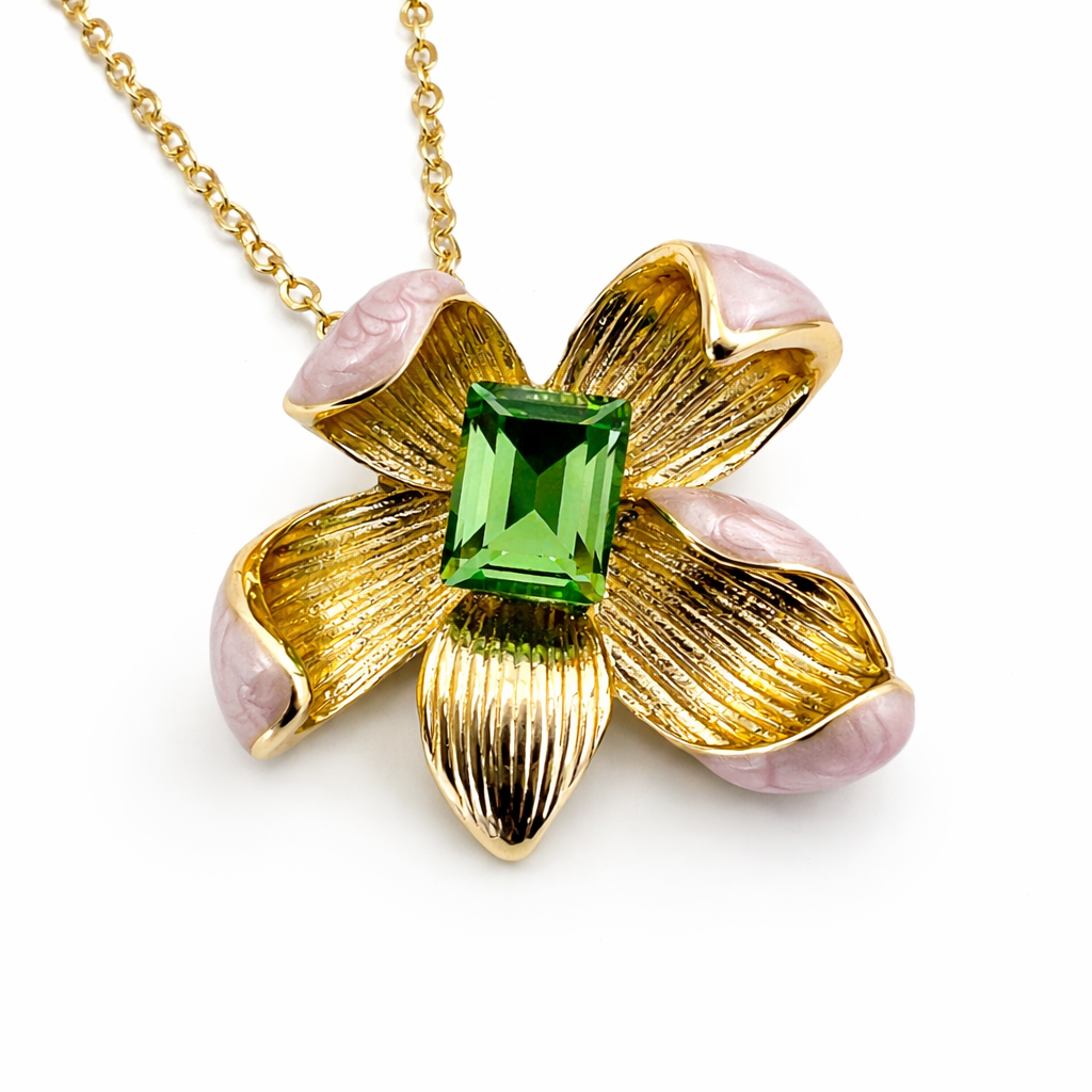 Gold-plated floral pendant jewelry set with green stones, including necklace and earrings, by Jinam.