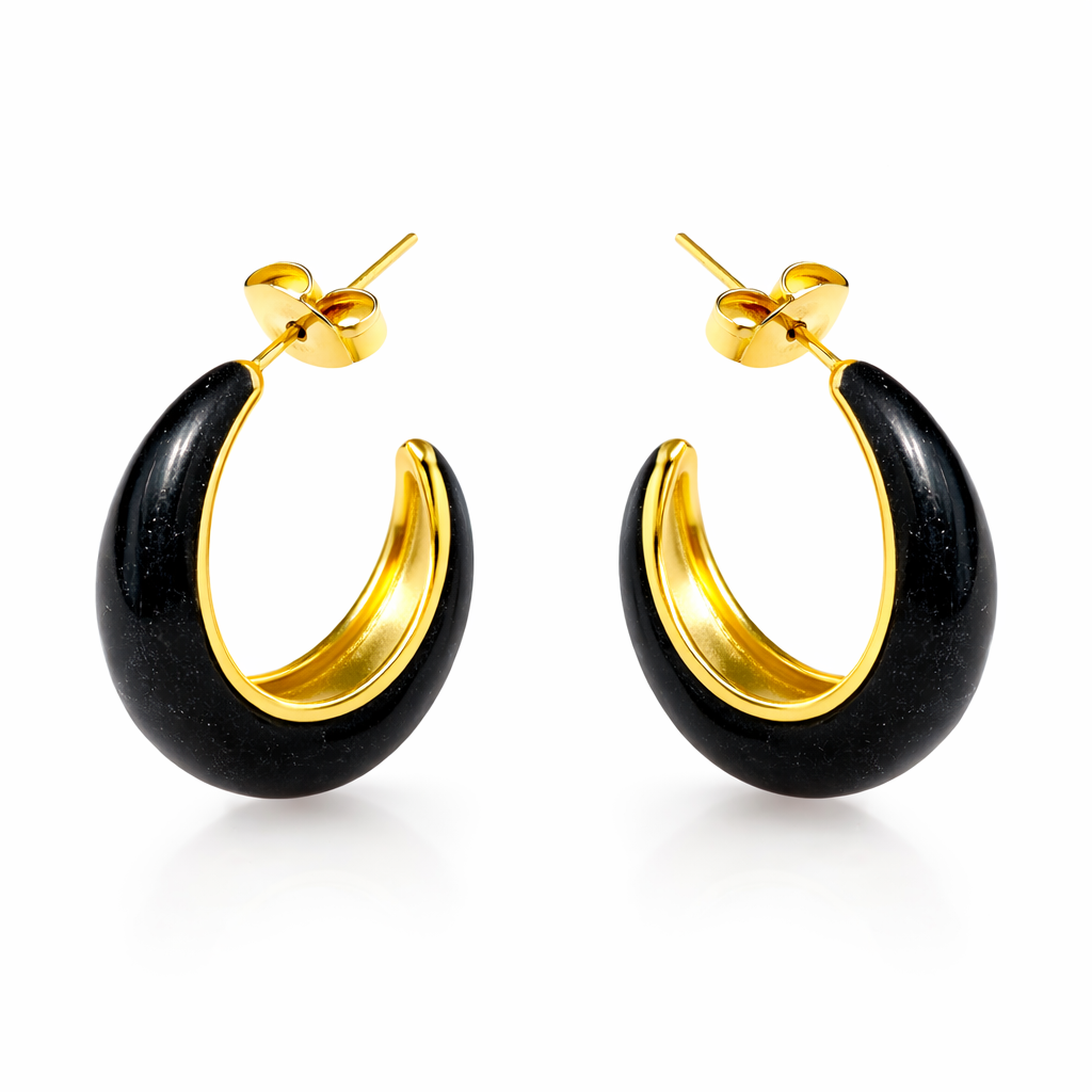 Jinam black enamel chunky hoop earrings with bold, thick circular design and shiny finish, displayed against a neutral background.