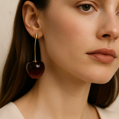 Jinam cherry glossy drop earrings featuring vibrant red cherry-shaped jewelry with a shiny, polished finish.