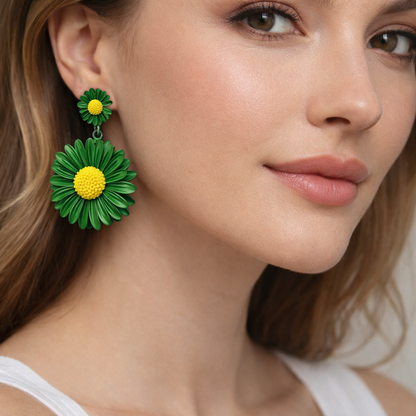Green daisy floral drop earrings by Jinam featuring delicate flower-shaped design and lightweight dangle style.