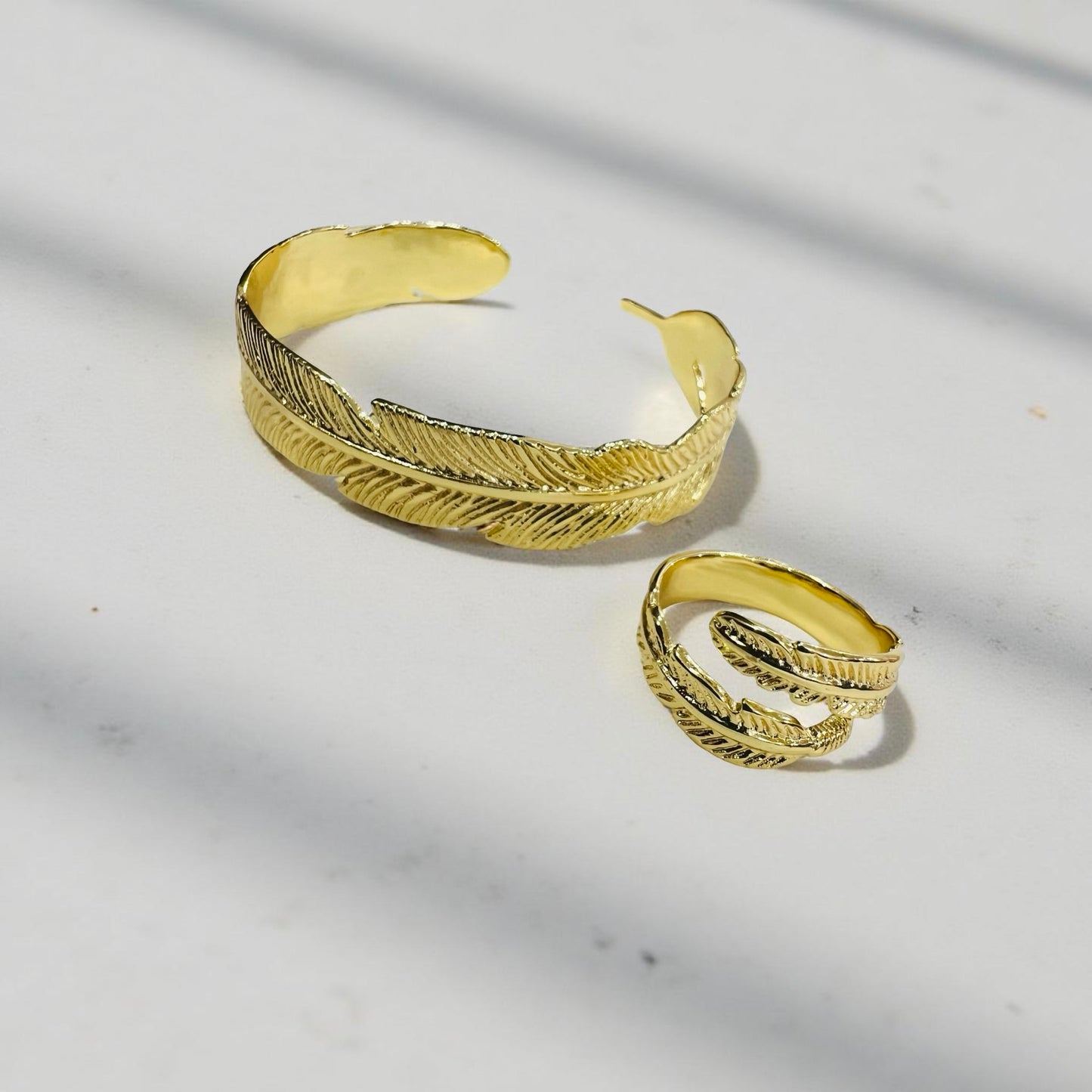 Gold Feather Bracelet & Ring Combo – Elegant Nature-Inspired Set