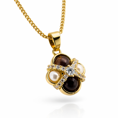 Gold-plated tiger eye and pearl pendant necklace set with CZ crisscross design, featuring a stylish and elegant jewelry piece from Jinam.