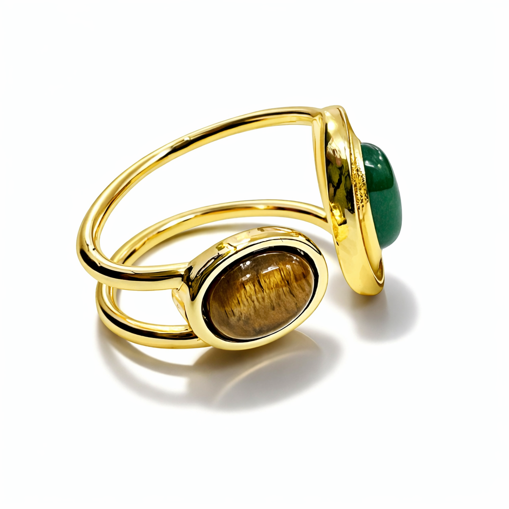 Jinam dual stone open adjustable statement ring with two prominent stones and an open, modern design on a neutral background.
