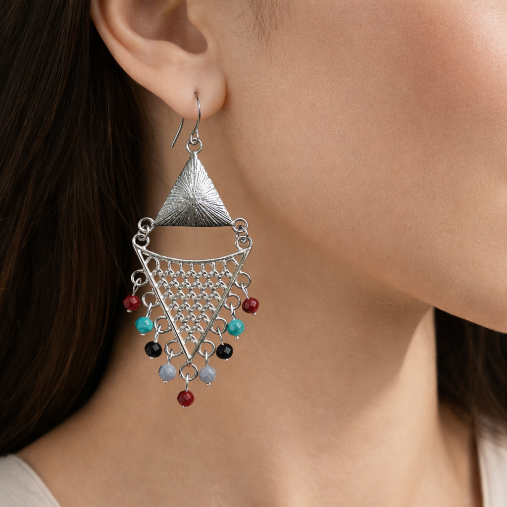 Oxidised silver triangle dangler earrings by Jinam with multicolor beads hanging from the design