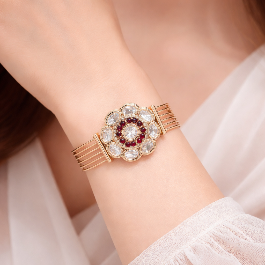 Rose gold Ruby Kundan adjustable bracelet by Jinam with intricate gemstone detailing and elegant design.