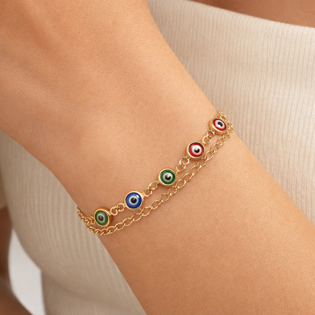 Multicolor Evil Eye charm chain bracelet by Jinam featuring vibrant beads and a silver-toned clasp.