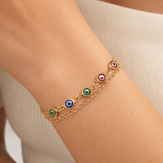 Multicolor Evil Eye charm chain bracelet by Jinam featuring vibrant beads and a silver-toned clasp.