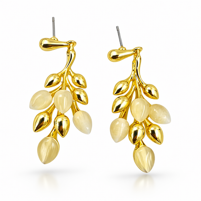 Gold-plated leaf cluster pendant and earrings set by Jinam, featuring delicate leaf designs in a coordinated jewelry set.