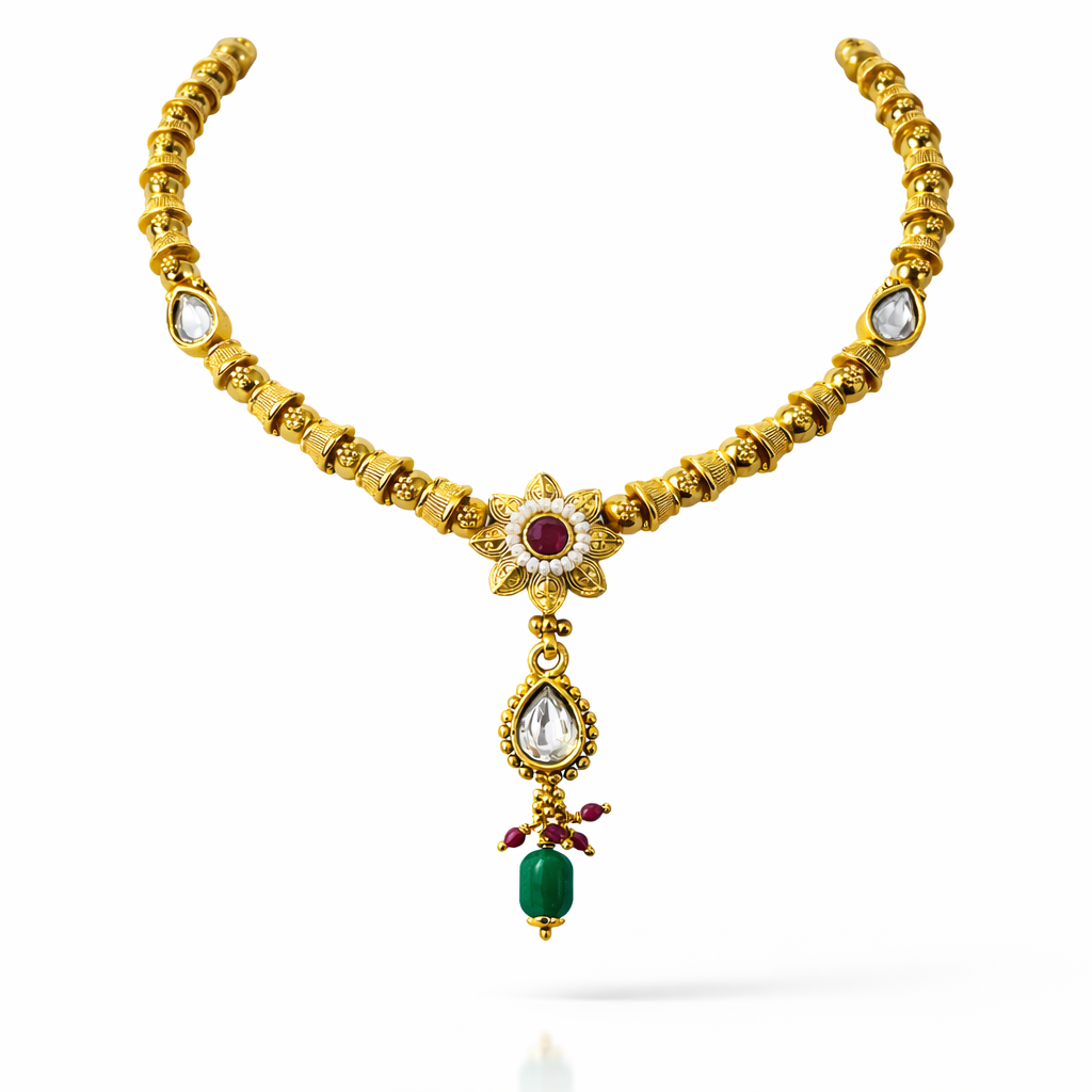 Jinam Floral Grace Ruby and Emerald Necklace set featuring a delicate floral design with vibrant gemstones and intricate metalwork.