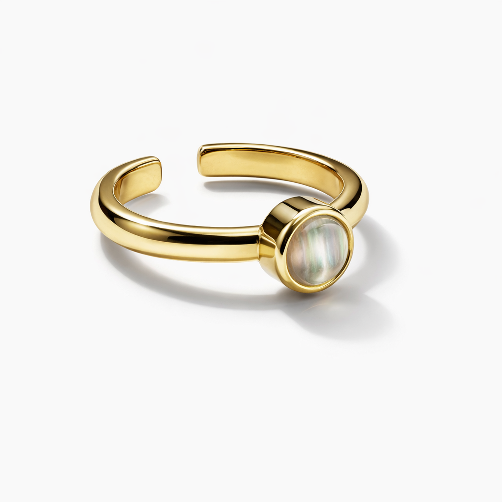 Gold-tone minimalist adjustable ring featuring a natural iridescent shell stone, by Jinam.