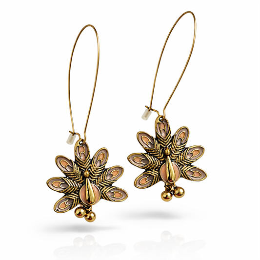 Gold-plated peacock motif hook earrings by Jinam with intricate feather detailing and antique finish.