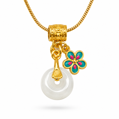 White Jade Donut and Teal Enamel Flower Charm Necklace on white background