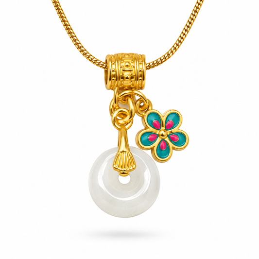 White Jade Donut and Teal Enamel Flower Charm Necklace on white background