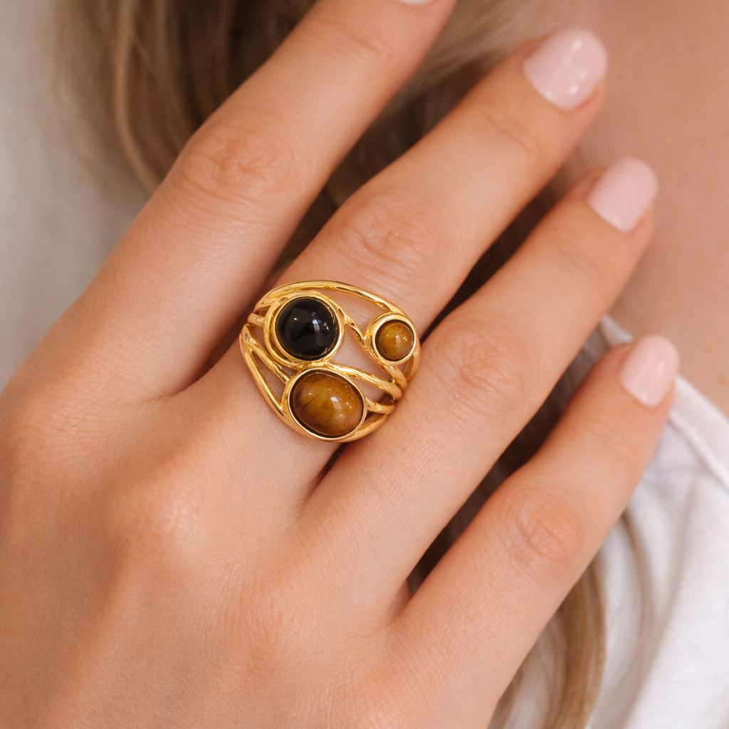 Jinam Golden Tiger Eye multi-stone statement ring featuring a bold design with golden and brown stones set in a silver band.